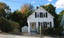 Charming New Englander with all the charm of yesterday. This home has been lovingly cared for and maintained. In-town location, with in walking distance to schools, shops, restaurants and parks! This home has a large eat in kitchen, living room, den and