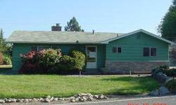 Nice property in Grants Pass, has .98 acres. Large in-ground pool out back. Spacious kitchen & dining area. Kitchen has some appliances. Living room has a lovely fireplace. Most of the home has hardwood flooring. Good size master bed & bath. Purchase this