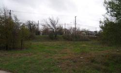 More than a half an acre of land in a readily accessible location. All utilities are in place, and the land is ready to build on. Plenty of space to take advantage of the commercial overlay. Create a work/live space that blends in with the recently built,