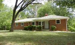 This quaint brick rancher would be a GREAT starter home!! There are 3 bedrooms, an unfinished basement with a fireplace and hardwood floors in the living room. There are vinyl replacement windows in this easily accessed home --Come take a LOOK!!Listing
