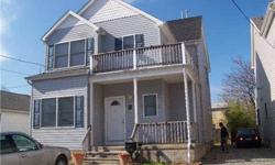 Cozy and 8 year young 4 bedroom home just across the street from the beach. One large bedroom & full bathroom downstairs suited for guests and elderly occupants. Upstairs decks and balconies to enjoy waterviews, bay breezes and the NYC skyline. Large