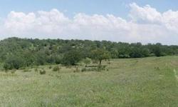Secluded 24.17 acres with varied terrain that offers great hilltop and building sites. Property offers sandy soil, cover for wildlife and grass for your animals. Property has county road frontage on two sides with nice views. Property is located in
