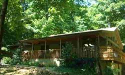 Your own private resort style home nestled in the woods on 5.19 acres in Zane Trace School District and is surrounded partially by the State Forest. L shaped living room and dining room plus a dining area off the updated kitchen. Nice size bedrooms. Wrap