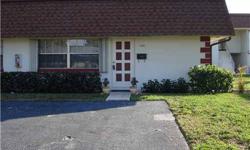 Cozy half duplex on quietcul-de sac Walk to most amenities, community bus avail,also.Remodeled counters etc.Heated pool/clubhouse. Small pet.Park at your door.Accordian shutters throughout.62 units on approx. 11 acres East of US #1. Poss. Owner Financing.