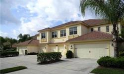 GREAT FIND! Really nice first floor coach home with LAKE VIEW. This 2 bedroom plus den, 2 bath condo offers a 2-car attached garage. Ceramic tile and carpet throughout. Located close to Downtown Naples, this property is in Madison Park which offers bike a