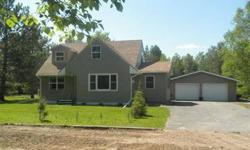 Perfectly kept country home with that Northwoods Feel! 4BR 1 1/2 story home sitting on 2+ acres. Large oversized insulated / heated 2+ car garage & beautiful yard / field with towering Red Pines is the setting you stroll out to from the home. Inside you