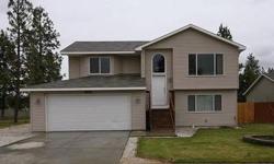 Beautifully maintained home with soaring cathedral ceilings,spacious and bright kitchen with pantry. Large fenced yard with sprinkler system and a patio. Great living room area downstairs perfect for entertaining! Located just minutes to EWU and other