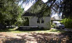 2 for 1! Fabulous Opportunity for a Two-Family Set-up. Two Legal Homes on 1/4 Acre Lot on the NW Side for the Price of One.....or Live in the Newer Home and Rent the older home or rent both. Older Home is the Original State Forestry Bunk House for
