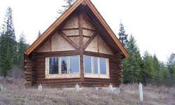 Log Cabin on 40 acres! Back up to N.F.S on two sides,River & Mountain views. Cabin is shell needs finished inside. There are two parcels one has a 2bd rm1 bath trailer with addition & deck to live while you finish cabin. Two 5000 watt generators stay.