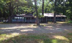 Beautiful home on Duck Puddle Road with 57 Acres that is a hunters dream. The back of the property backs up almost to the White river and a flooded area brings in good duck hunting. The home is 1752 SF and 2BR/1Bath which means the rooms are large and