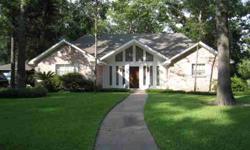 Big wooded corner Great big open plan HOME.High ceiling in Great Rm area open to dining and Huge Kitchen!!NEW TILE FLOORING KIT,DINING,UTILITY,WET BAR,OFFICE.Master suite ONE SIDE AND office at rear. Notice the size of the utility rm having lots of