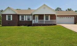 This maintenance free brick & vinyl home is move in ready & has ameneties such as