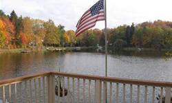 Waterfront property. Jackson township. Imagine full wheelchair access from garage to your boat dockwow! Elevator from upper to lower level , gorgeous lake view from both levels, plus nice size deck and screened in porch, non skid covering on ramps. Roll