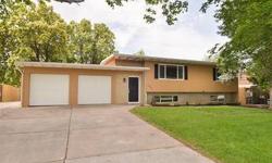 Beautifully remodeled inside & out, tile floors & back splash, stainless steel appliances, new carpet & paint throughout, 2 car garage with tons of storage & additional workshop in back, covered deck, new window, tile surrounds & floor in bath, new h2o