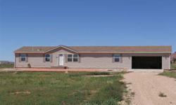 Here is a very rare opportunity to own an affordable home on 5.16 acres located in the Canyon Country subdivision just 7.5 miles east of downtown Kanab with views that make postcards jealous! This 2004 home is in excellent condition and boasts features