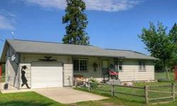 1996 Built, 2 Bed, 1 Bath home with attached garage! Country feel and small town charm. Handicap accessible inside and out! Gas forced air, heat pump and central A/C. Fully fenced 1/3 acre. Mountain views for your enjoyment! USDA 100% Financing