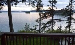 Waterfront cabin with amazing views! Shares a community dock, which is located right below the cabin...just follow the stairs to the gravel beach. There's plenty of parking plus a large 1 car garage/shop with power. Great place to call home or perfect for
