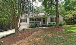 Cute as can be ranch style home nestled in the woods of Tega Cay. Great floor plan with eat in kitchen & formal dining room. Laminate floors, spacious great room w/brick fireplace. Large 2 car garage is an added value. Enjoy the front porch & the private