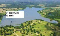This beautiful one + acre 176 foot waterfront lot #221 on Wildlife Way in phase two of Waters Edge Ranch is located five miles northwest of Athens Texas. The lot has huge oak trees and is located on the south end of the lake close to the swimming pool and