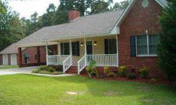 PRIVACY AT THE END OF THE ROAD This is a beautiful brick 3 bedroom 2 bath home with a kitchen/dining room comb, den has fireplace, and the laundry room room is large Almost new hardwoods and freshly painted and also a screen porch on back as well as front