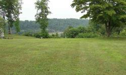 2.85 acre lot sits above road with a great lake view year round. Paved street, city water, electric, and cable.Listing originally posted at http