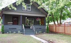 Charming 1907 Craftsman located in the Historic Cannon Addition of the South Hill. This home was updated in 2011 and features a formal entry, original wood floors, wood fireplace and dining room built in buffet/hutch. It has a loft upstairs that could be