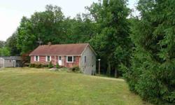 REDUCED! Country living but just minutes away from it all. Brick front rancher w/1.25 acres partially wooded lot.Gorgeous pastoral views.Home features a large country kitchen with breakfast bar,2 bedrooms & 2 full baths on main level.Lower level has 3rd