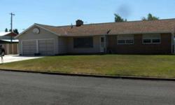 Great location, close to schools and hospital. 4bed, 2 bath, fenced lot, fenced off street parking(new concrete) for RV or toys. Gas furnace and hot water,forced air cooling. Newer carpets. Gas/Wood fireplace.Listing originally posted at http