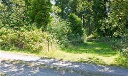 Great park-like acreage near North End ferry terminal. Large Evergreens, trails and private glade. Take your vision to the county and improve this property! Build an awesome home and mother-in law, barn or outbuildings.Listing originally posted at http