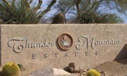 What a great time to build your dream home. Well priced lot with amazing mountain and city light views. Prime lot that is almost an acre in size. Thunder Mountain is an exclusive gated community with less than 100 custom luxury home lots. It features