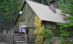 Beautiful updated cabin, stunning water and mountain views. Quick access to boat launch, wilderness hiking trails, 10 minutes to White Pass skiing. Year round water and power. Washer, Dryer, Sat.tv.internet/cell service available. Master bedroom plus open