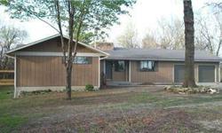 5 Wooded Acres, private setting, ranch style home, 2-car attached garage, walk-out basement, fireplace in living room, new carpet throughout, ceramic tile in kitchen, 2 decks (1 off master bd).
Listing originally posted at http