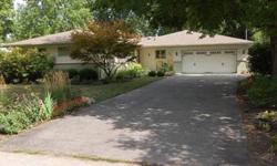 LOVE IT! This cute home has floor to ceiling windows which provides a full view of the beautiful backyard. This backyard has a paver brick courtyard, perenials, and shade trees. This home is totally renovated