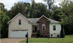 This custom one owner home is located in desirable Phase 1 of Holly Tree. Impressive brick & stone front. Open floor plan, perfect for entertaining. Kitchen has breakfast bar & lots of cabinets. Over sized, covered deck overlooks private, wooded