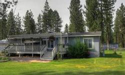Nicely Updated 1568 Sq Ft Skyline Manufactured Home on 5+ Acres. This 3 bed, 2 bath home was updated in 2009 with a new kitchen, baths and flooring (hardwood). Add 5 acres of tranquility and a 24x32 garage/shop and this house is worth checking out!Listing