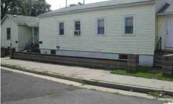 Great Investment. This two family home sits on a large corner lot.Listing originally posted at http