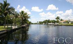 ABSOLUTELY GORGEOUS cleared 90' canalfront lot in Westwood section of Ft Myers Shores. This lot is situated on a 150' wide canal, which is a stones throw to the river. This lot offers a newer drive in dock and lift, with power and water. City water and