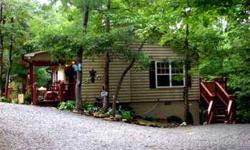 Gardener's Delight - A perfect getaway mountain cabin in Murphy NC. Secluded with end of road privacy. This 2BR/2BA home is in a beautiful wooded setting.Listing originally posted at http