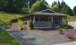 Privacy in town on the dead end street with manufactured home with an extra lot included in price. Lots of wildlife and trees for tranquility and nice sunny area for a garden. Open concept with dining area off the kitchen, large master with master bath