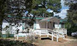 This three bedrooms/two bathrooms manufactured home has a nice floorplan with two master suites and family room/den with woodstove for winter enjoyment.
Diane Dahlin is showing 3092 Chevelon Rd in OVERGAARD, AZ which has 3 bedrooms / 2 bathroom and is
