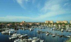 Enjoy sensational southwestern marina and Charlotte Harbor views from this 7th floor 2BR/2BA upgraded condominium at Burnt Store Marina! As you step into this residence, you are greeted by tile flooring in the main living areas, soothing paint tones,