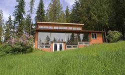Home in the Tall Timber! This Earth Berm Home w/outstanding view of Hooknose Mtn.sets on 10 acres (mol) on timber & meadows very private & backs up to N.F.S land. 2bd 1bath, Great rm w/ floor to ceiling windows open to Kitchen w/breakfast bar,informal