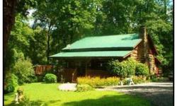 A Rustic Lane leads to this secure getaway Log Home on 5+ acres just minutes from town. This peaceful home offers modern amenities, stone fireplace 2BR, 2 BA, sleeping loft and well equipped kitchen. Enjoy nature all seasons on the screened porch. A