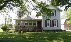 Beautifully remodeled farmhouse in the country! Quiet 3 acre setting with a creek. Updates include