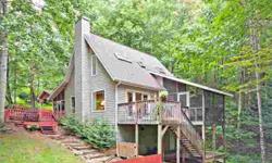 -Desirable Crabtree area. Mountain cottage nestled on wooded lots, small stream and paved access. Two screened porches bring the outdoors inside. Enjoy privacy, wood burning fireplace, hot tub and sky lights. Not a cookie cutter plan -come see!Listing