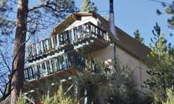 IF A CABIN IN THE TREES IS YOUR MOUNTAIN DREAM, LOOK NO FURTHER. SITTING UP IN THE TREES WITH BEAUTIFUL MOUNTAIN, SKI SLOPE AND TREED VIEWS, THIS CABIN DELIVERS SOMETHING TRULY SPECIAL. THE SELLER FELL IN LOVE WITH THE DECKS AND VIEWS AND YOU WILL TOO! A