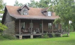 Log Cabin and 27.85 Acres in Evans County. This home features 1890 sq ft. Living room with fireplace, kitchen, b'fast area, dining room. Upstairs features 3Br 1Ba and an office. MBr is located on first floor. Land features planted pines, pecan trees and
