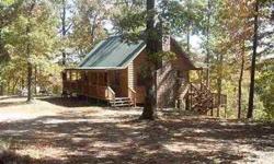 Beautiful cabin on 2.99 acres on the Caddo River! The cabin is a 1 bedroom, 1 bath with a loft for an extra bonus. It features a rock fireplace, front and back porches, porch swings, a deck with picnic table, stairs going down to the river, and a