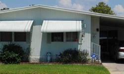 This is a 1983 doublewide for $17000 with 2/2 and the 1200 SqFt. is a rough estimate. It comes with a carport, washer, dryer, Florida room, laundry room, tile and carpet floors, and overall a very nice home It's only a 40+ community, has pool access, and