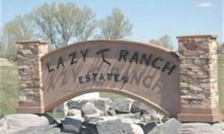Building permit ready acre +/- lots residential lot in premier Lazy T Ranch Estates near Twin Falls for an amazingly low price. Great north and south view. The subdivision features winding, paved streets, landmark signs and common area for picnics and
